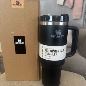 Stanley 40oz tumbler all black with gray logo.